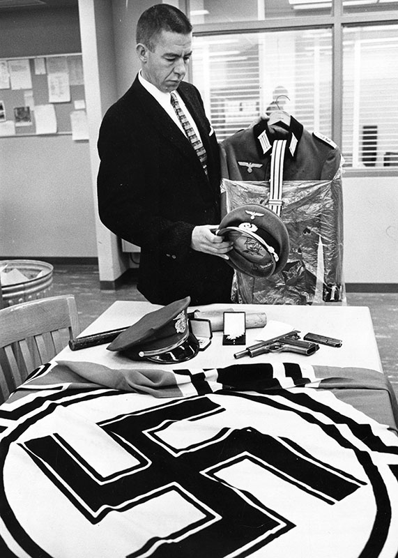 11/16/64: Nazi gear found in trunk of man arrested for possession of tear gas.