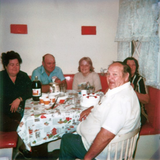 "My Mother, Father, younger Brother, Maternal Grandfather and Grandmother at a simple party to celebrate my Grandparents Anniversary taken in late 1979."