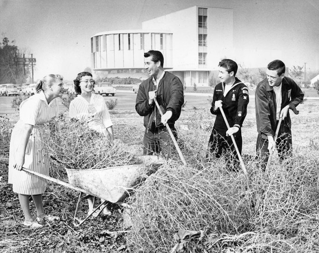 January 5, 1959 reads "Janet Kellenberger, 15, and Jackie Suess, 17, members of Candy Stripers, from left, aid Sea Scouts Bob Wheeler, 17; Steve Bidwell, 16, and Mike Strange, 15, in volunteer cleanup program of Valley Presbyterian Hospital. Sea Scouts, auxiliary of Explorer Scouts of America, and other organizations volunteer work hours for Van Nuys medical center."